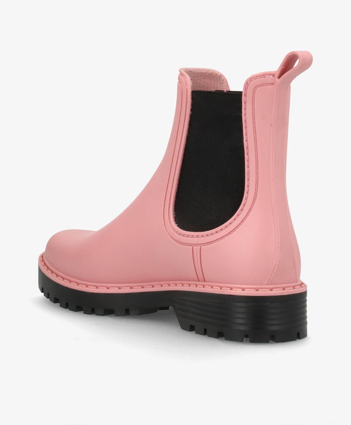 Lyserød gummistøvle med sort elastikindsats og kraftig sort sål, set fra siden.
