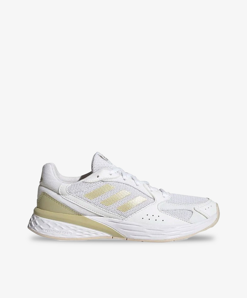 Hvide sneakers fra Adidas med guld applikationer.