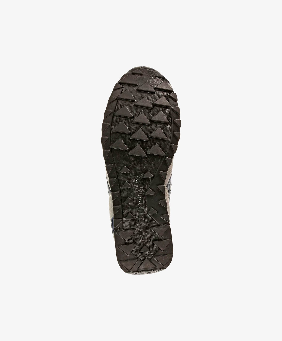 Sål af en sko med trekantede mønstre og tekstur, set fra bunden.