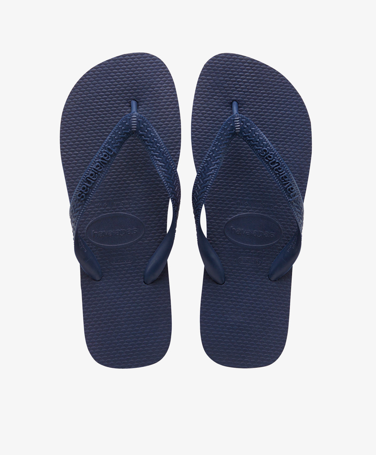 Mørkeblå dame slip-in sandaler med tekstureret sål og stropper.