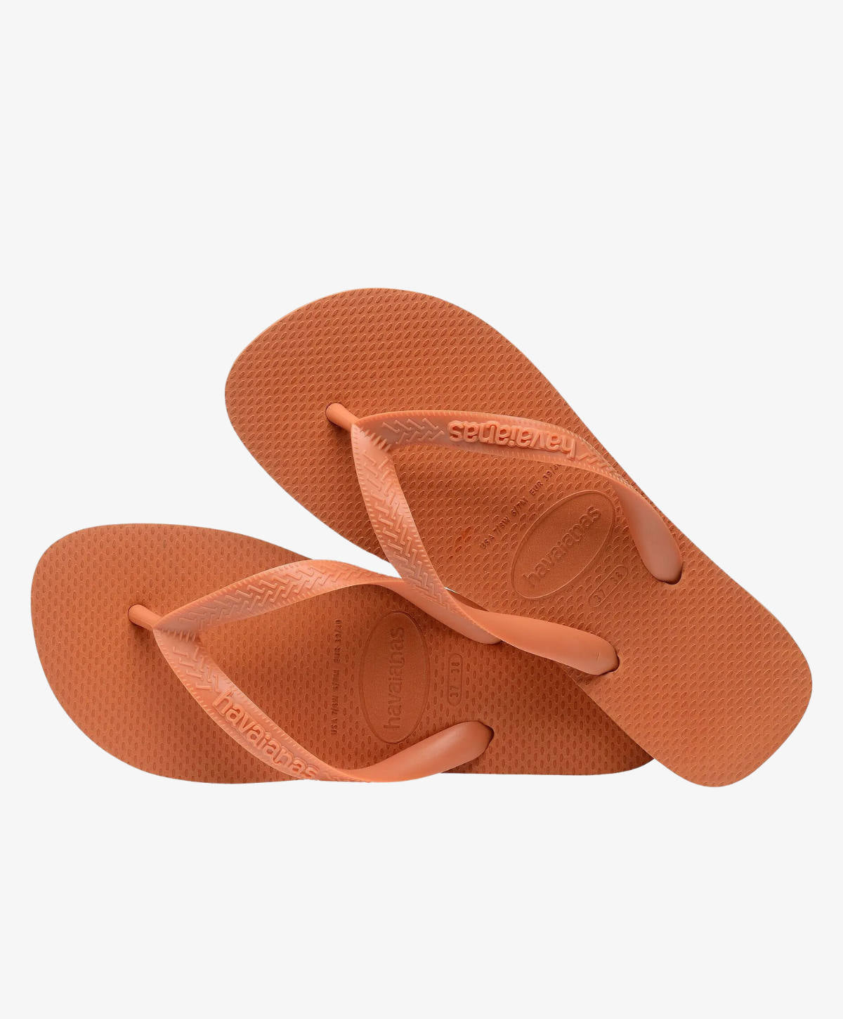 Orange klipklapper med tekstureret sål og stropper, set ovenfra.