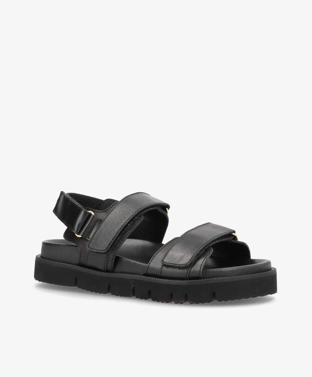 Sort damesandal med justerbare stropper og tyk sål.