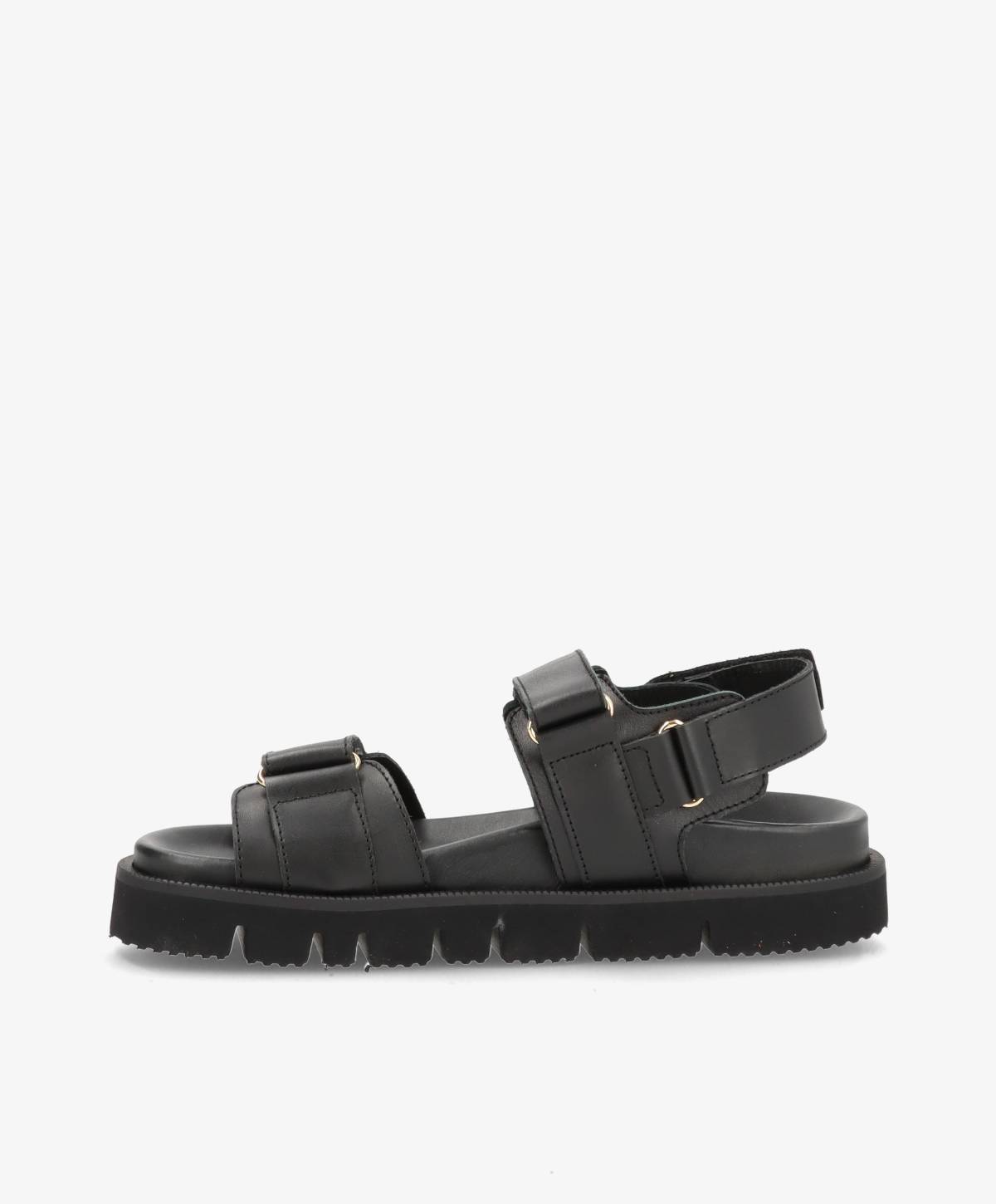 Sort damesandal med justerbare stropper og tyk sål.
