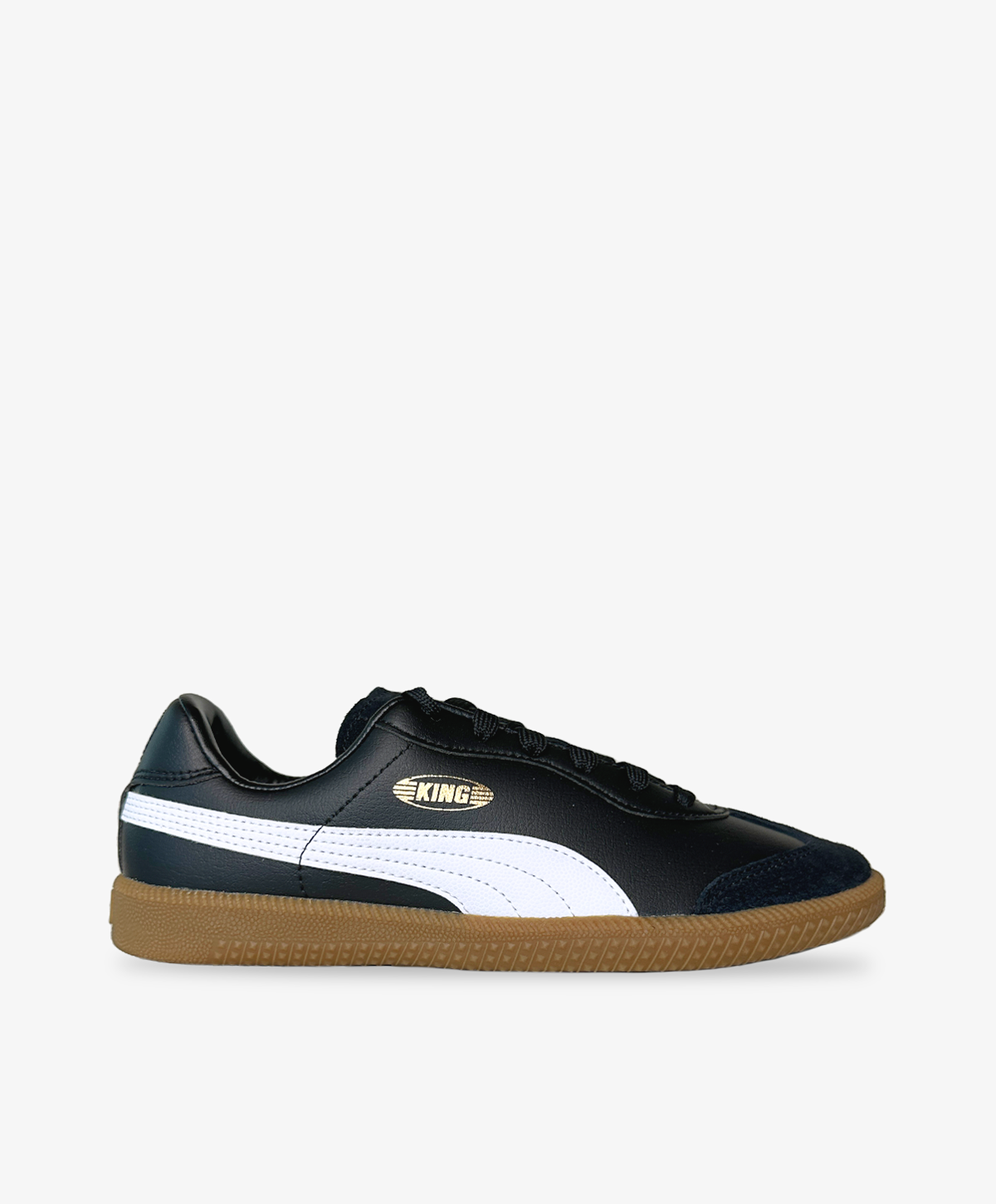 Sorte PUMA sneakers med hvide detaljer og brun bund.