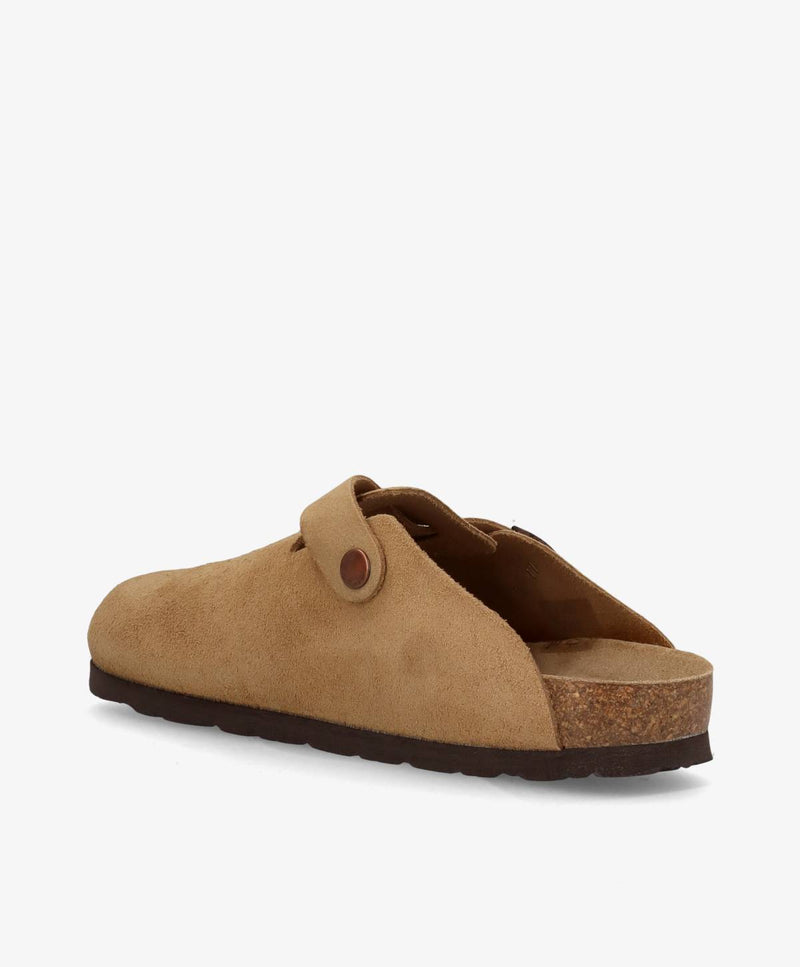 Beige slip-in damesko i ruskind med korksål og remdetalje.