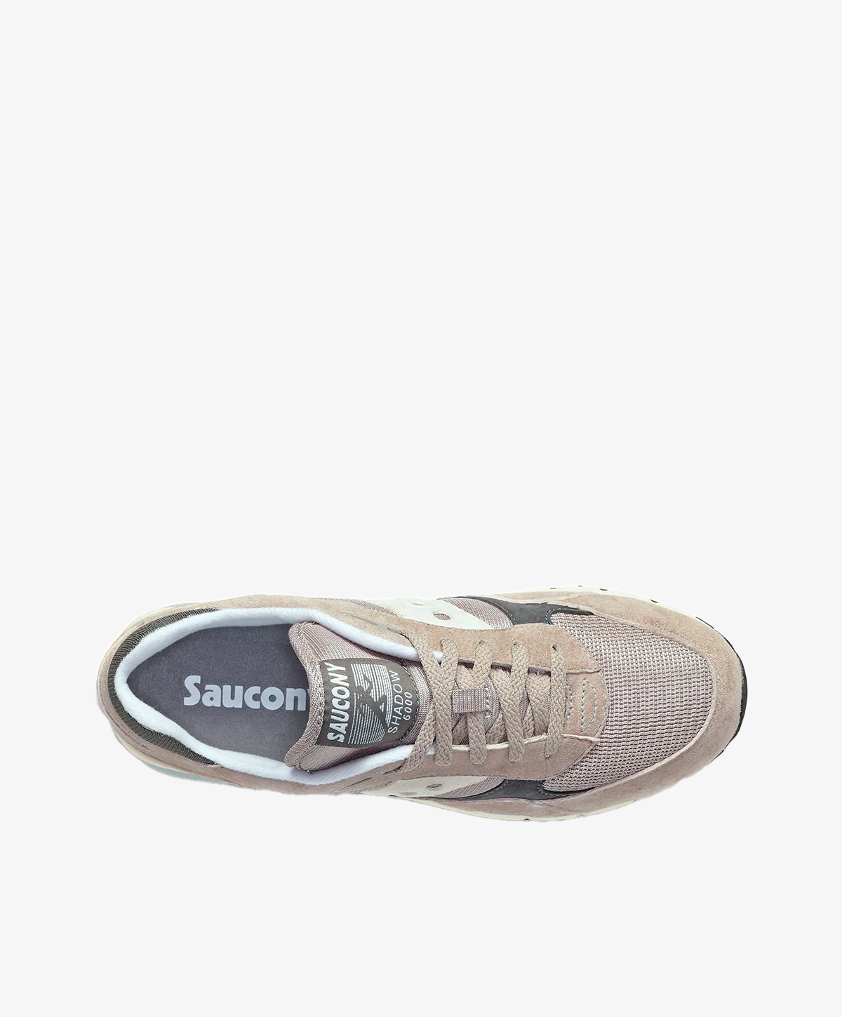 Dame sneakers i lys grå farve set ovenfra, med mærket "Saucony" synligt på indersålen.
