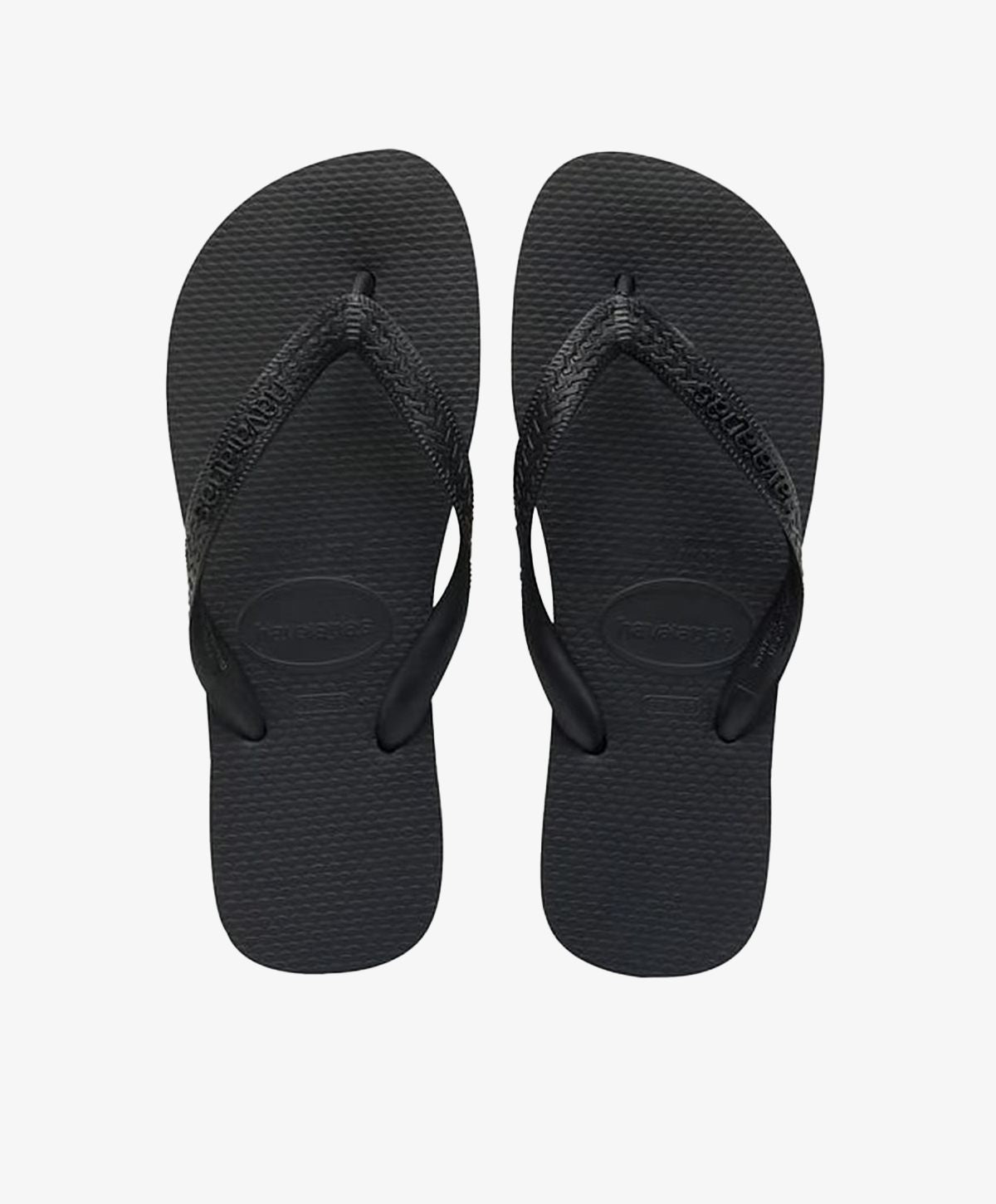 Sort slip-in dame sandaler med tekstureret rem og sål.